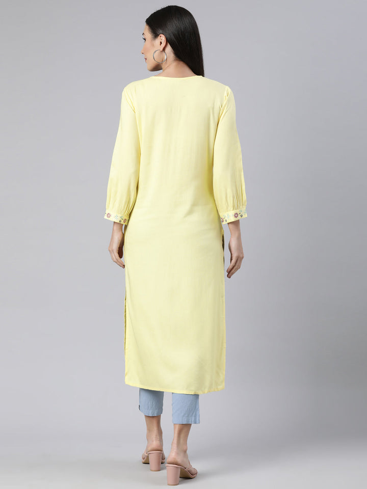 Neerus Yellow cotton solid straight kurti - side view
