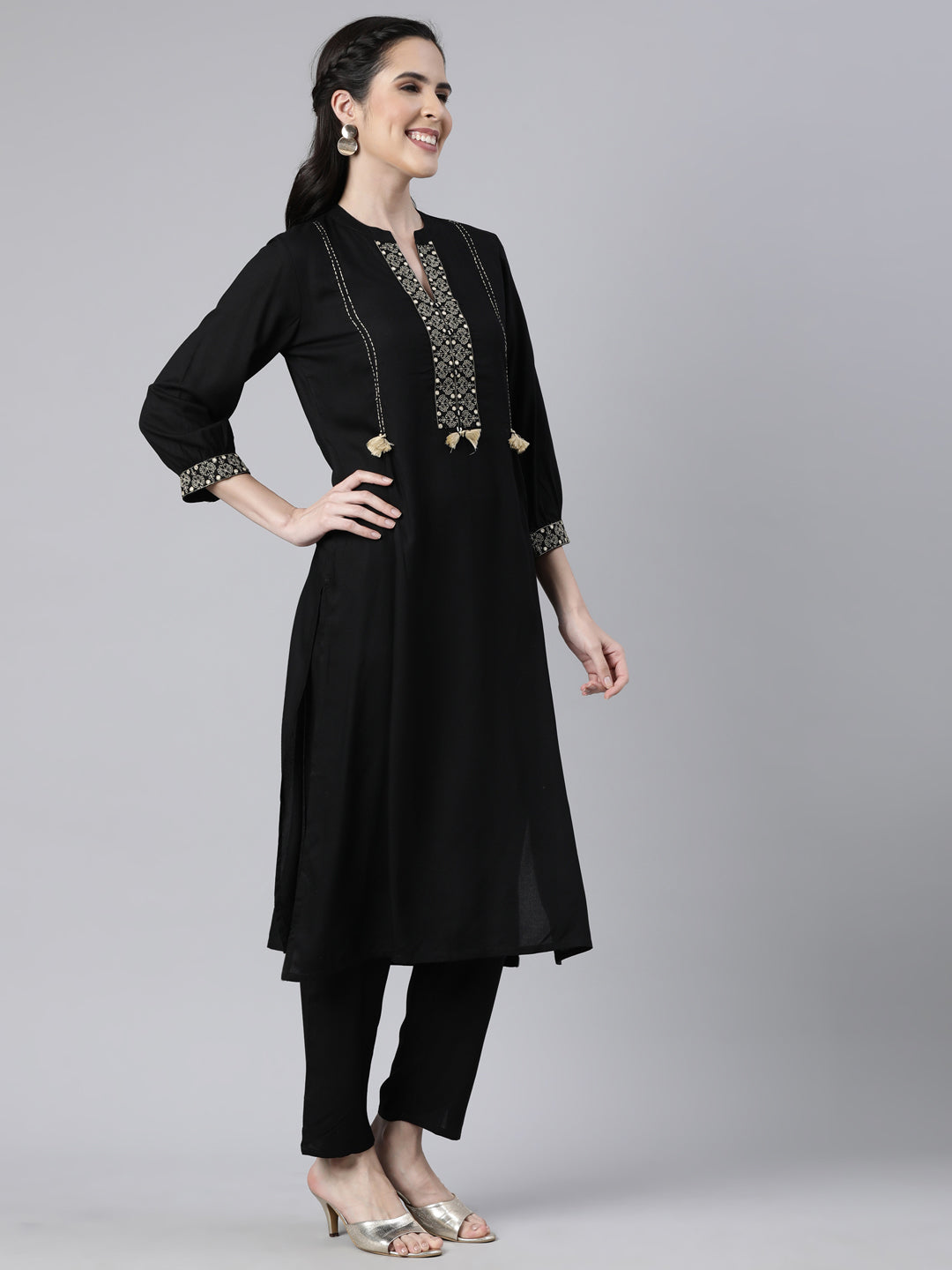 Neerus Black solid straight kurta set with trouser - back view