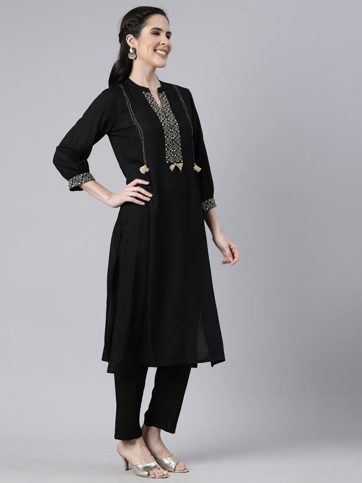 Neerus Black solid straight kurta set with trouser - back view
