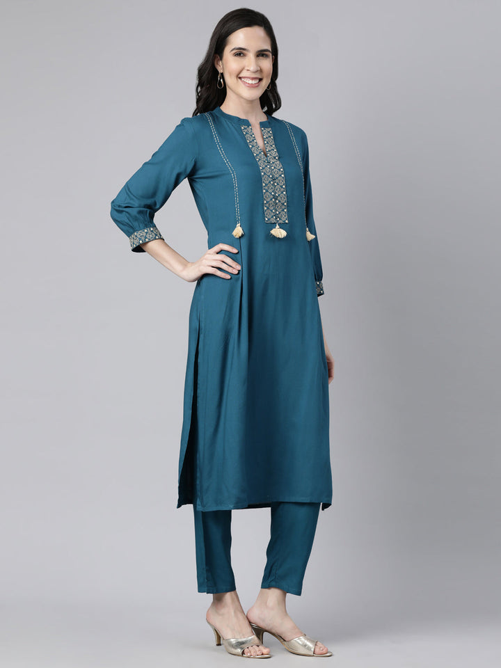 Neerus Blue rayon solid straight kurta set - back view