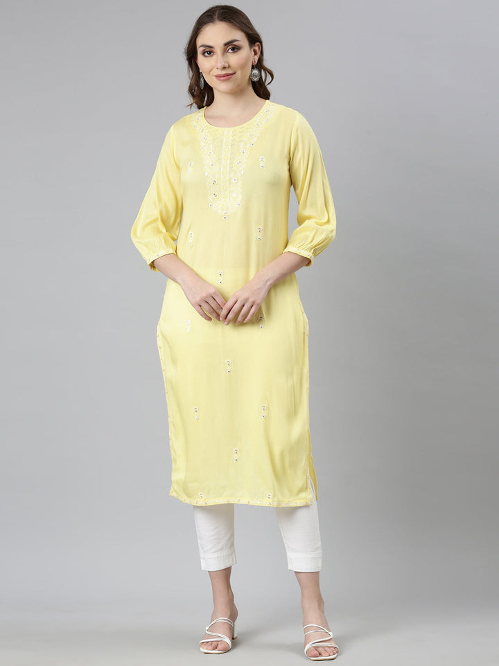 Neerus Yellow rayon printed straight kurti - front view