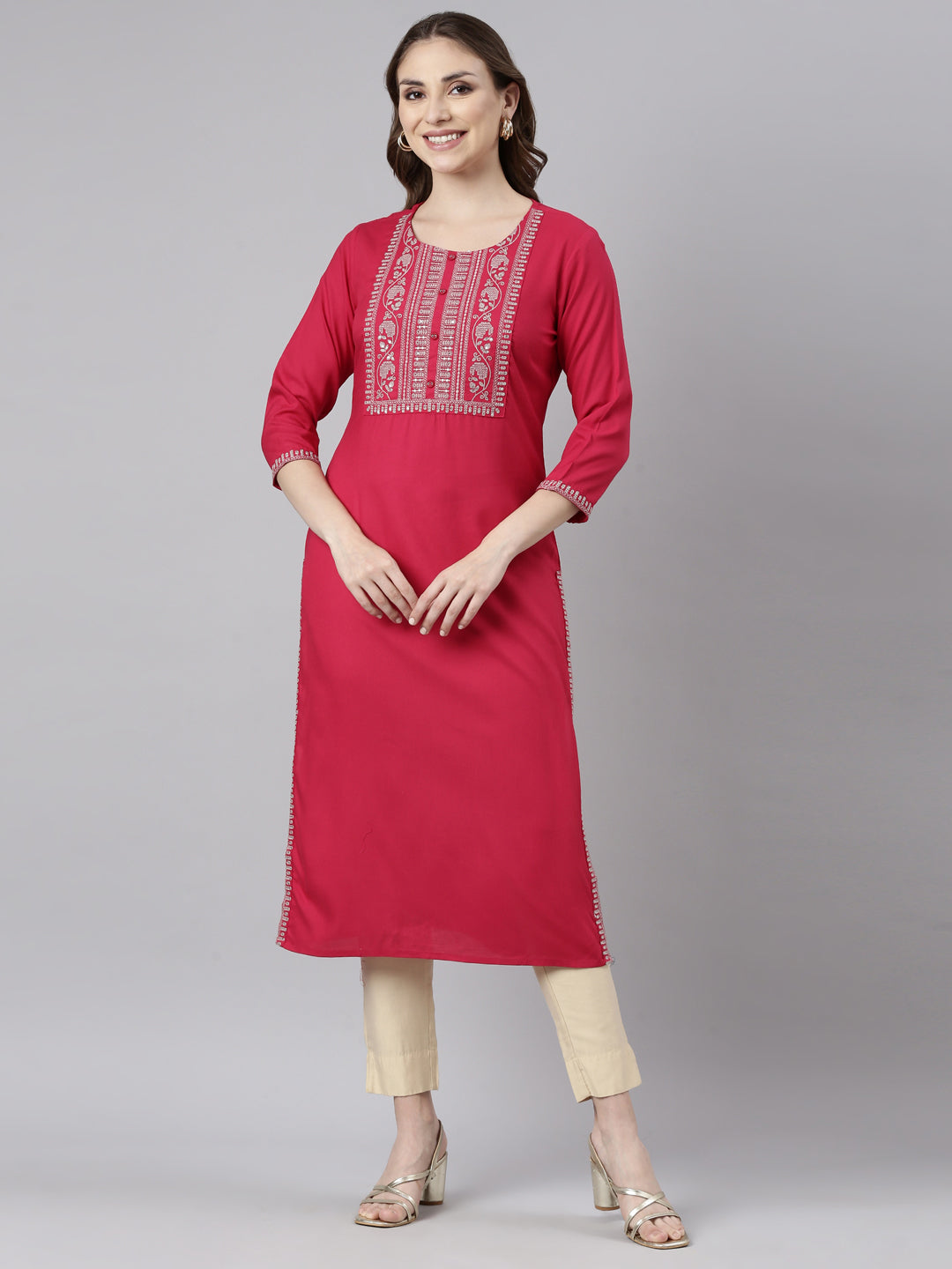Neerus Pink rayon solid straight panelled kurti - front view