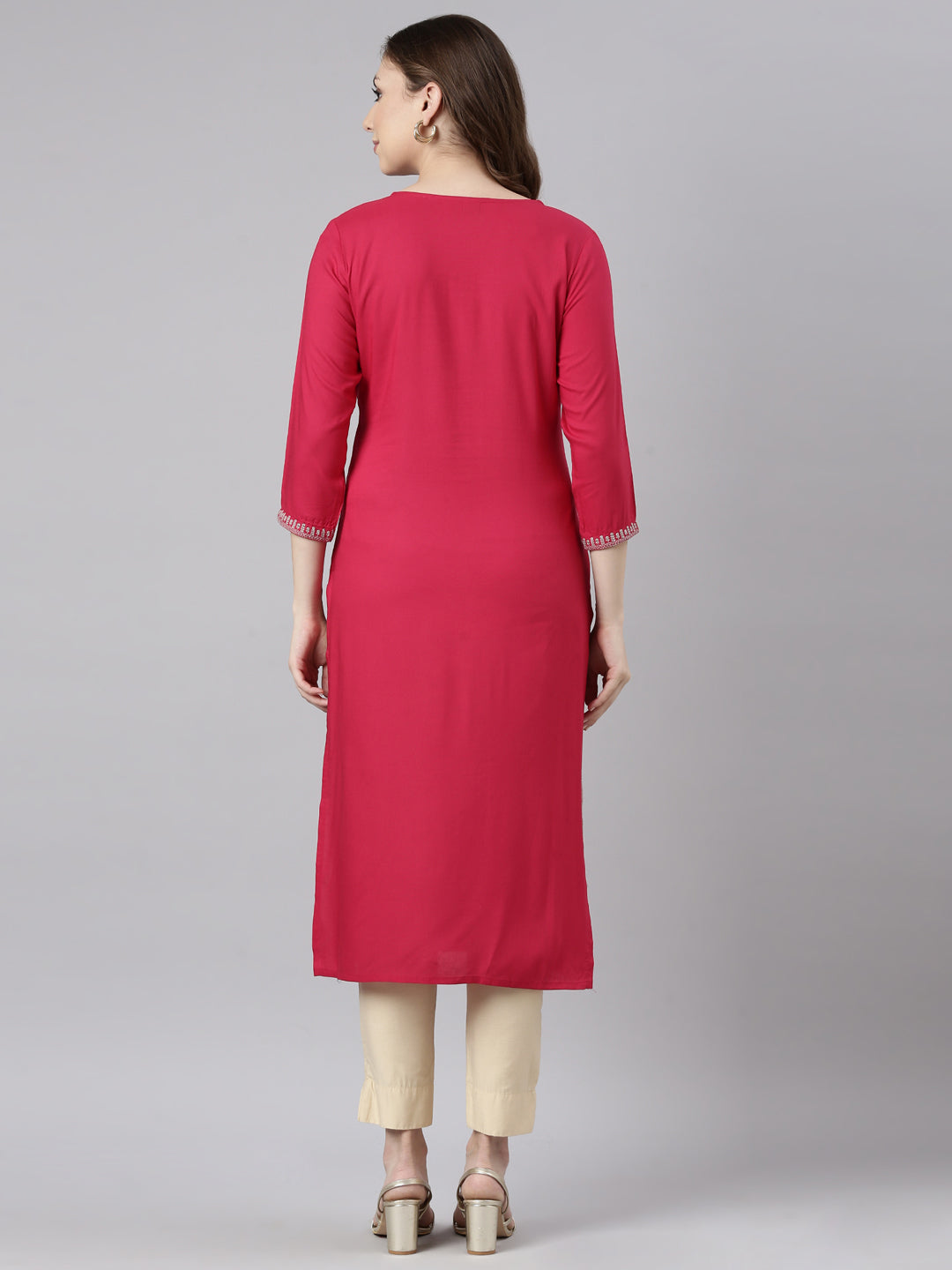 Neerus Pink rayon solid straight panelled kurti - side view