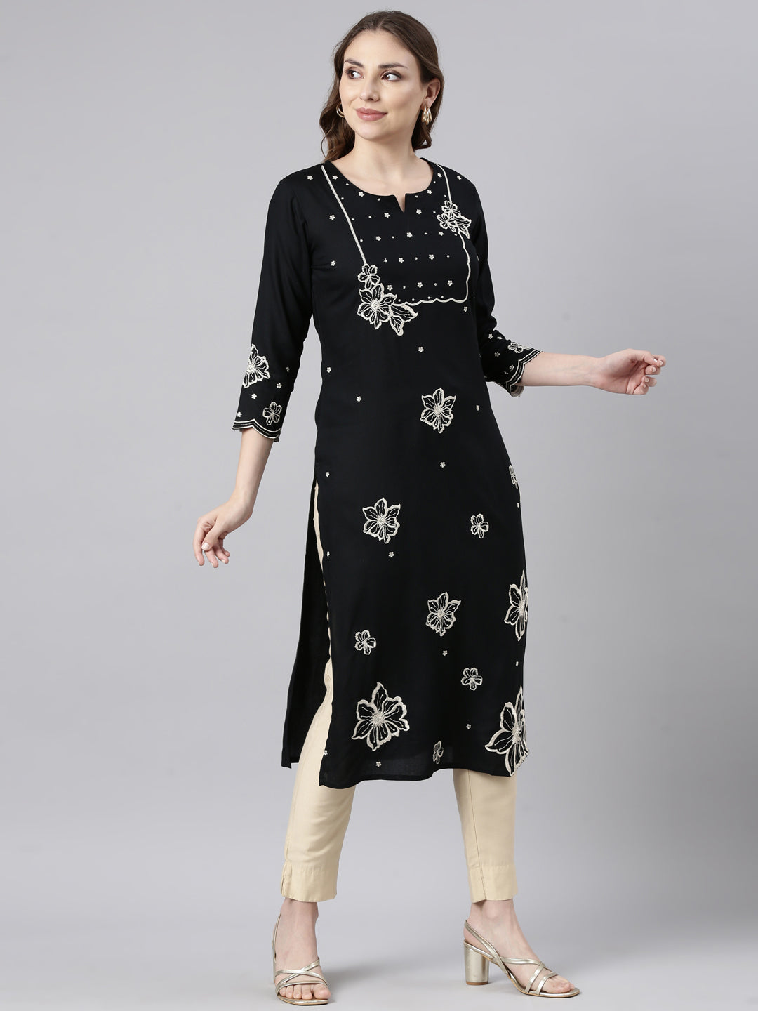 Neerus Black floral printed panelled kurti - back view