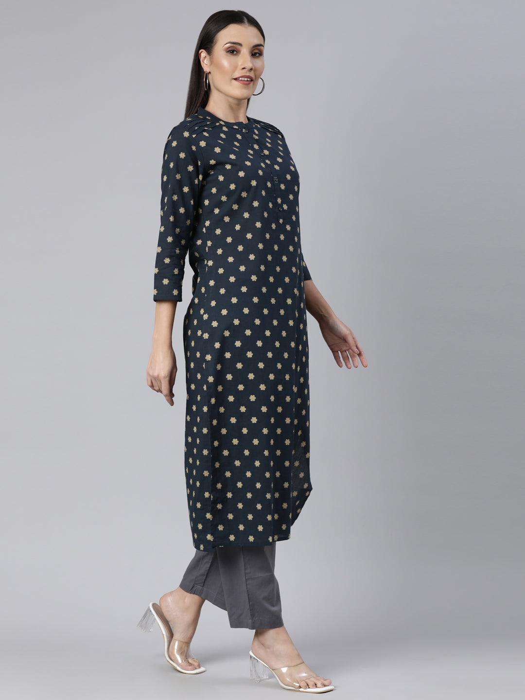 Neerus Yellow cotton printed floral straight kurti - back view