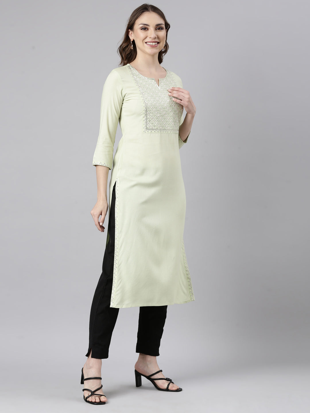 Neerus Green cotton printed straight kurti - back view