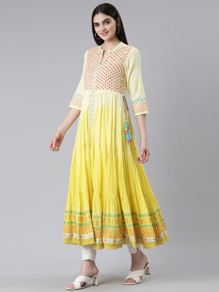 Neerus Yellow cotton printed flared kurti - back view