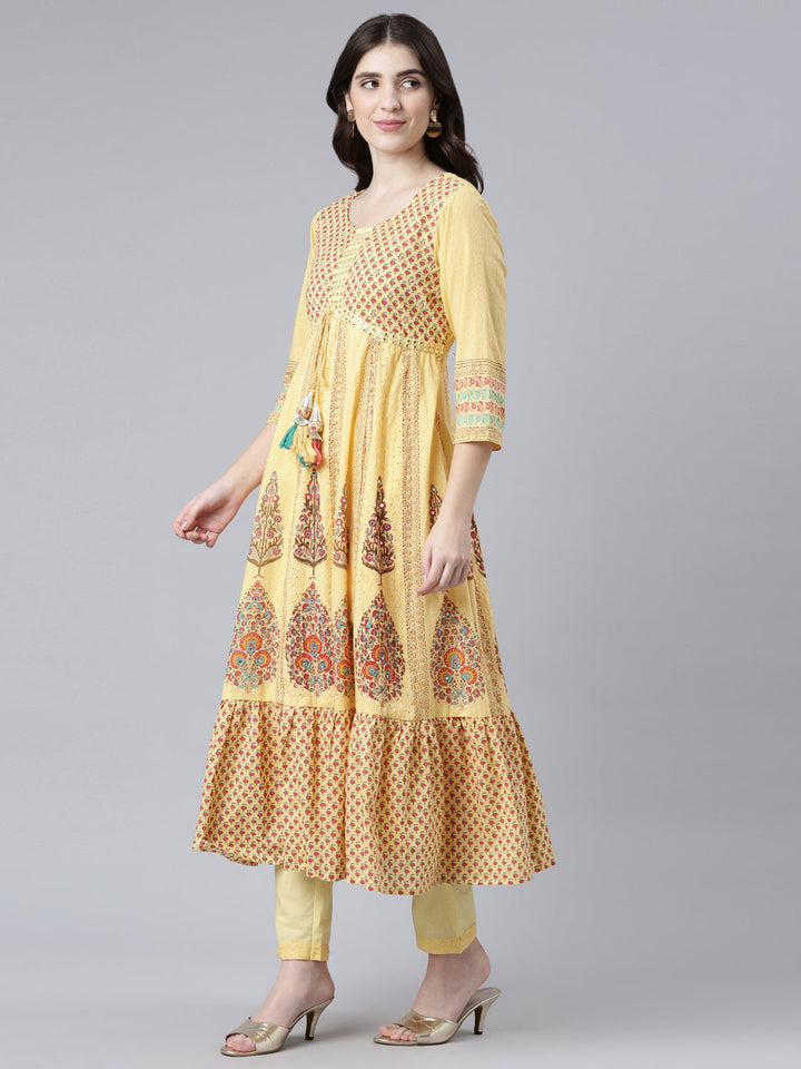 Neerus Yellow cotton printed kurta set with trouser and dupatta - back view