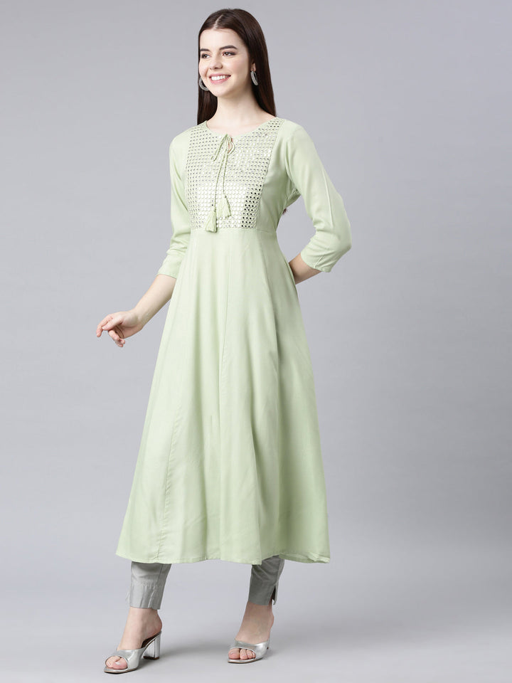 Neerus Green cotton solid anarkali kurti - back view