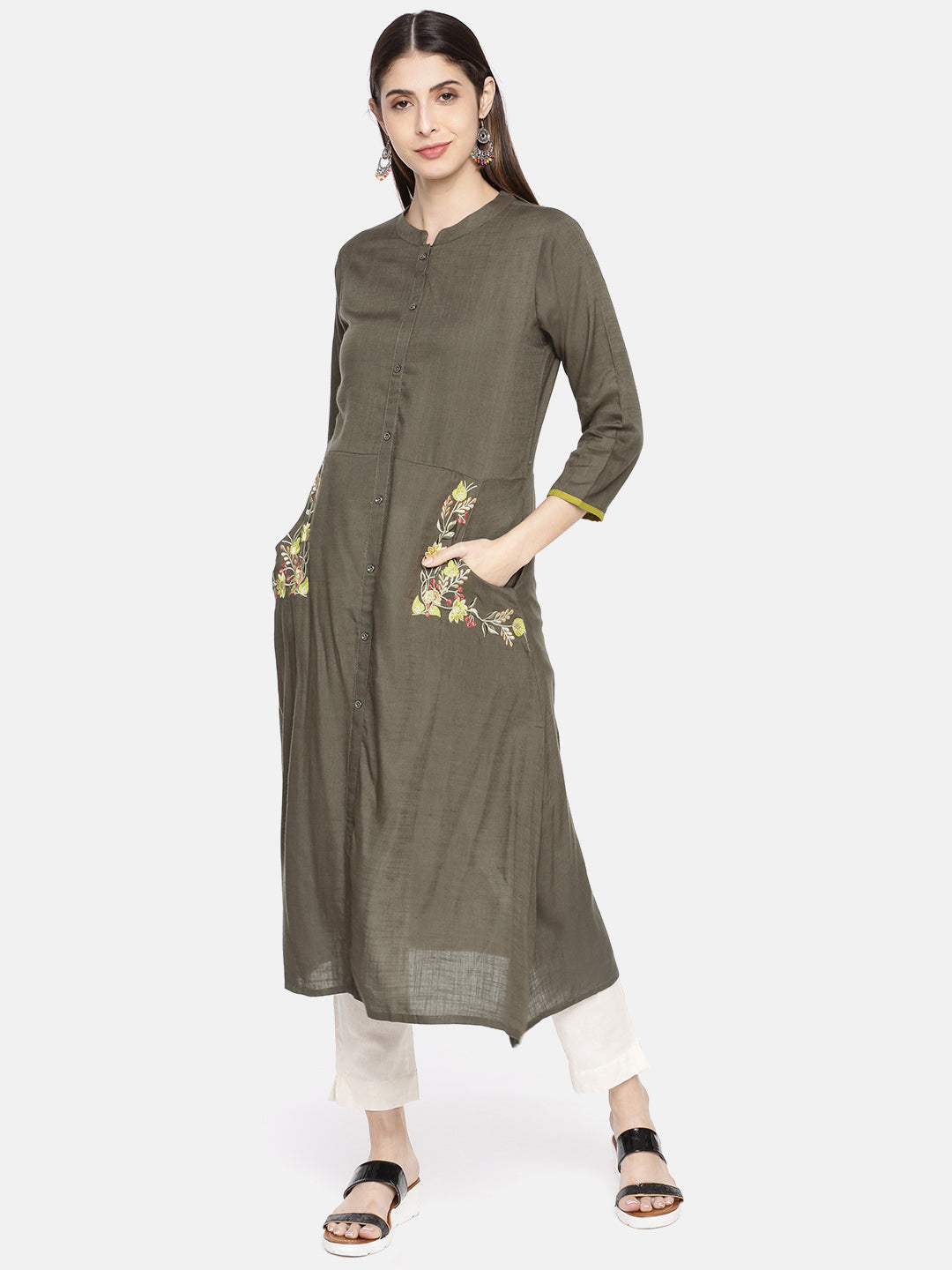 Neerus Green rayon embroidered straight kurta - front view