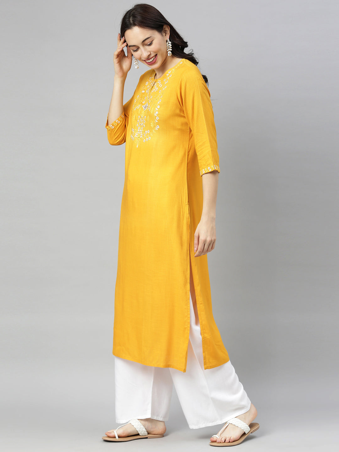Neerus Yellow embroidered straight kurta - back view