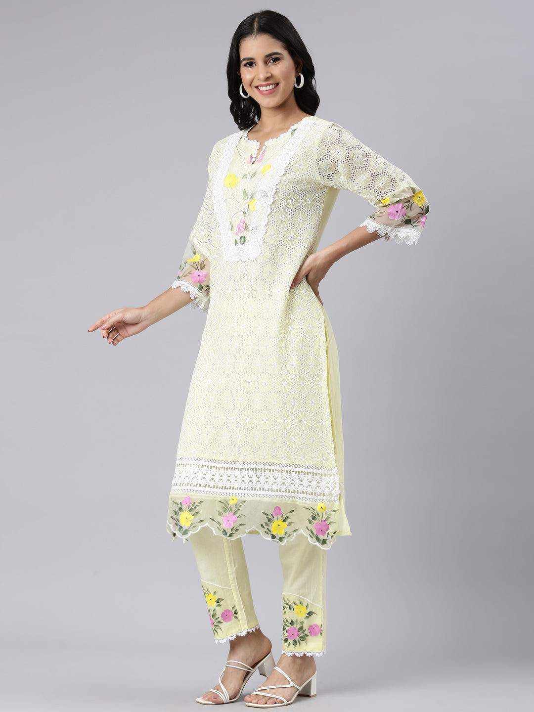 Neerus Yellow solid straight suit set with dupatta - back view