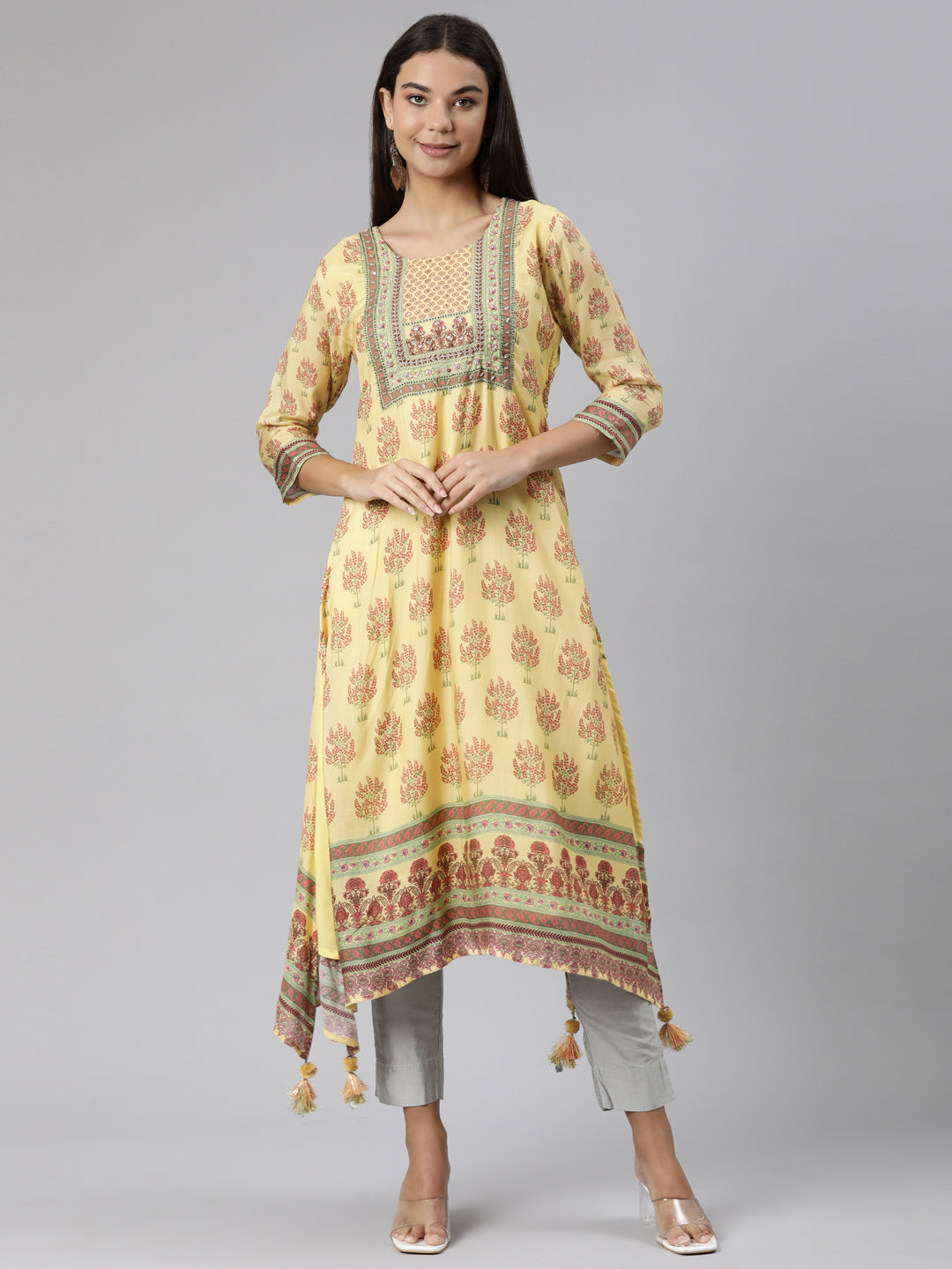 Neerus Yellow muslin printed high-low kurti - front view