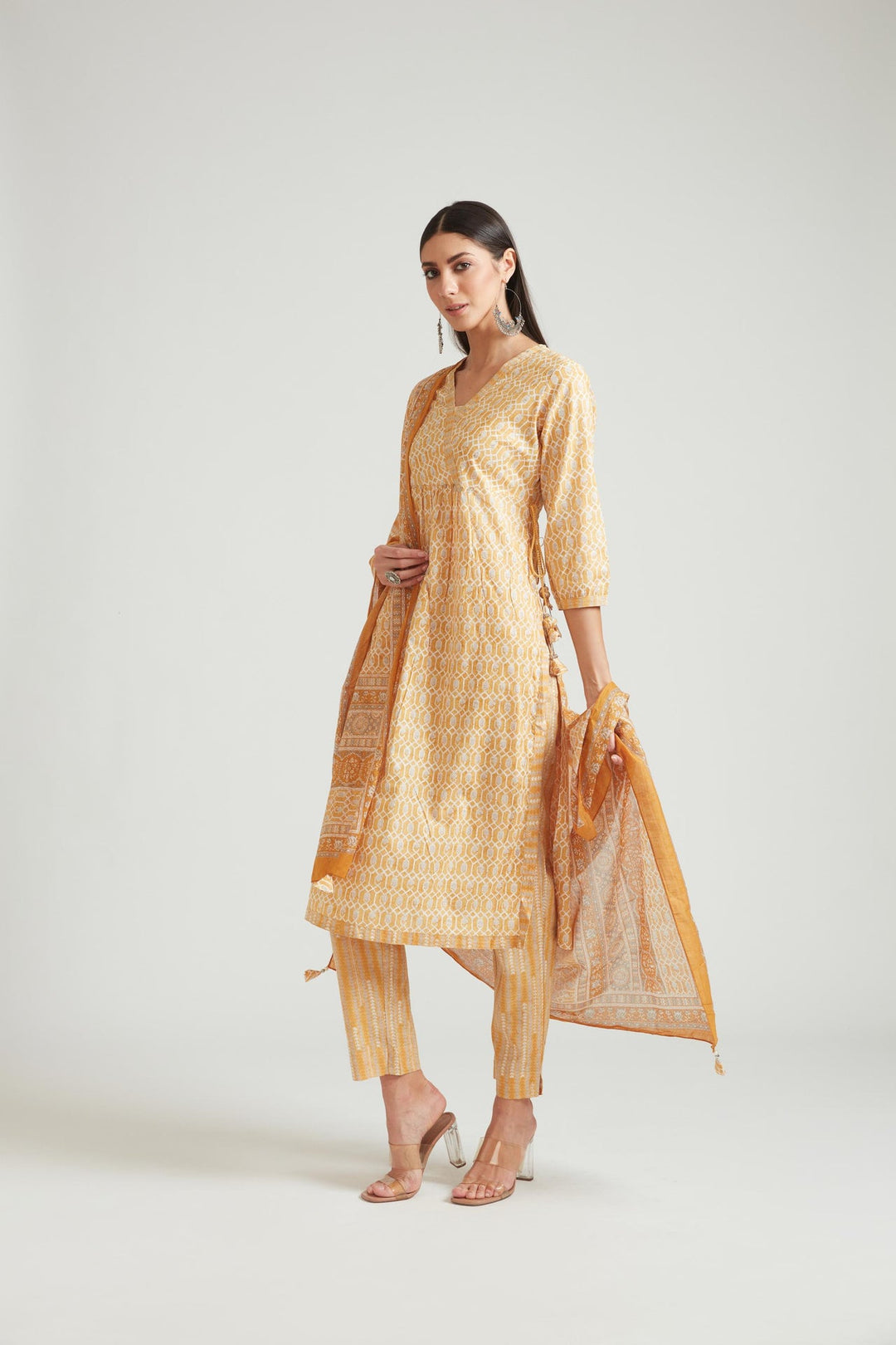 Neerus Yellow muslin straight kurta set - front view
