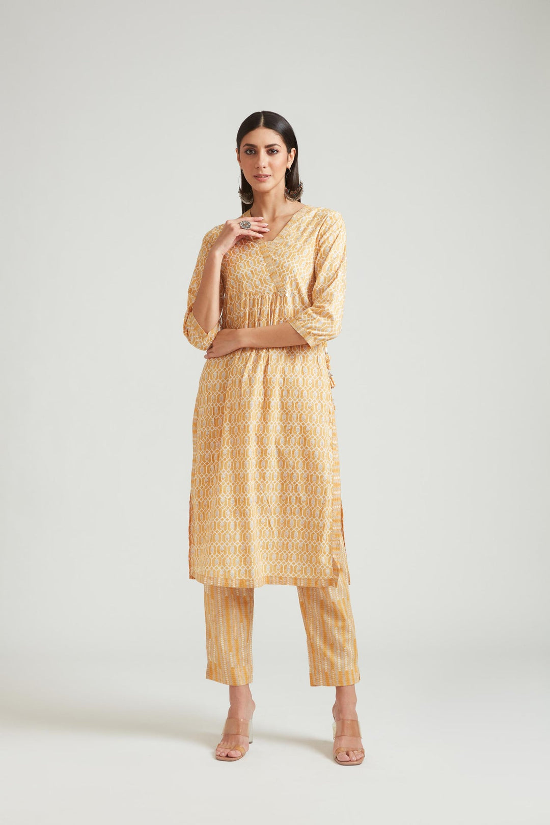 Neerus Yellow muslin straight kurta set - side view