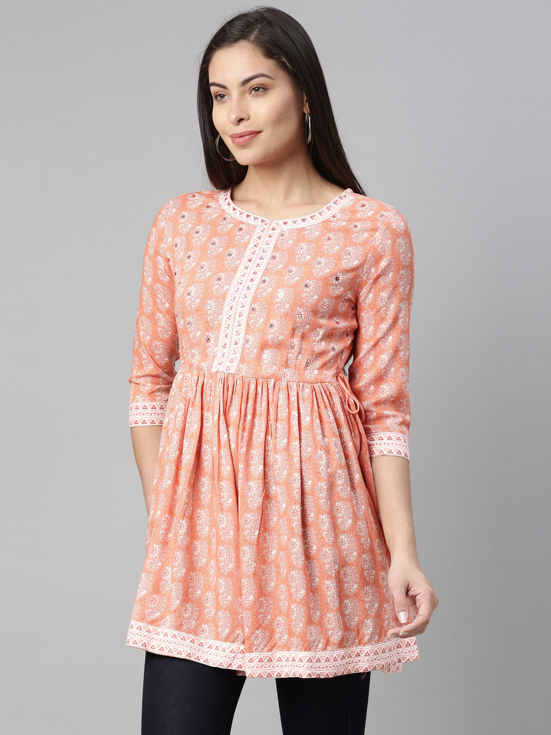 Neerus Pink floral printed sequinned pleated kurti - back view