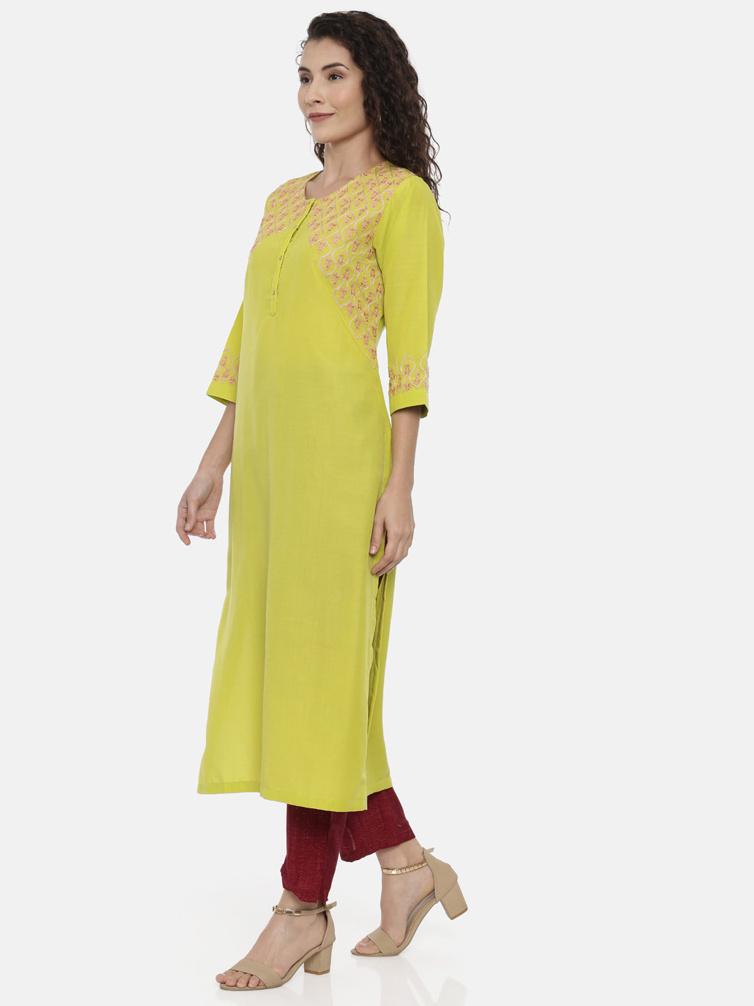 Neerus Yellow rayon thread embroidered kurti - back view