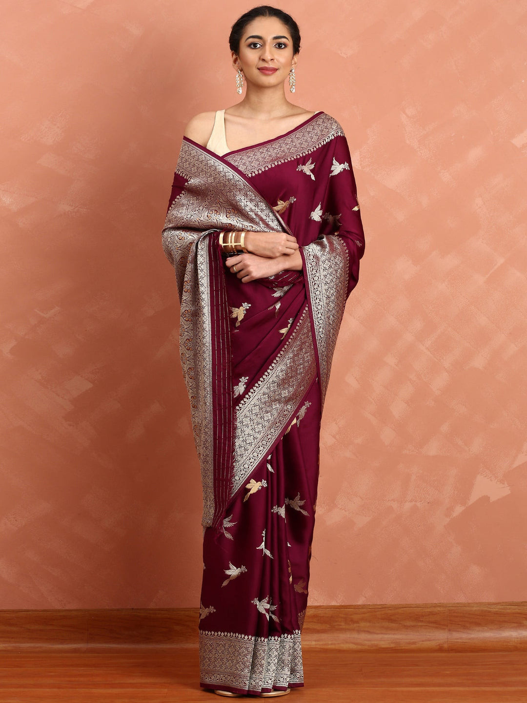 Neerus Maroon Banarasi woven saree with gold silver motifs - front view