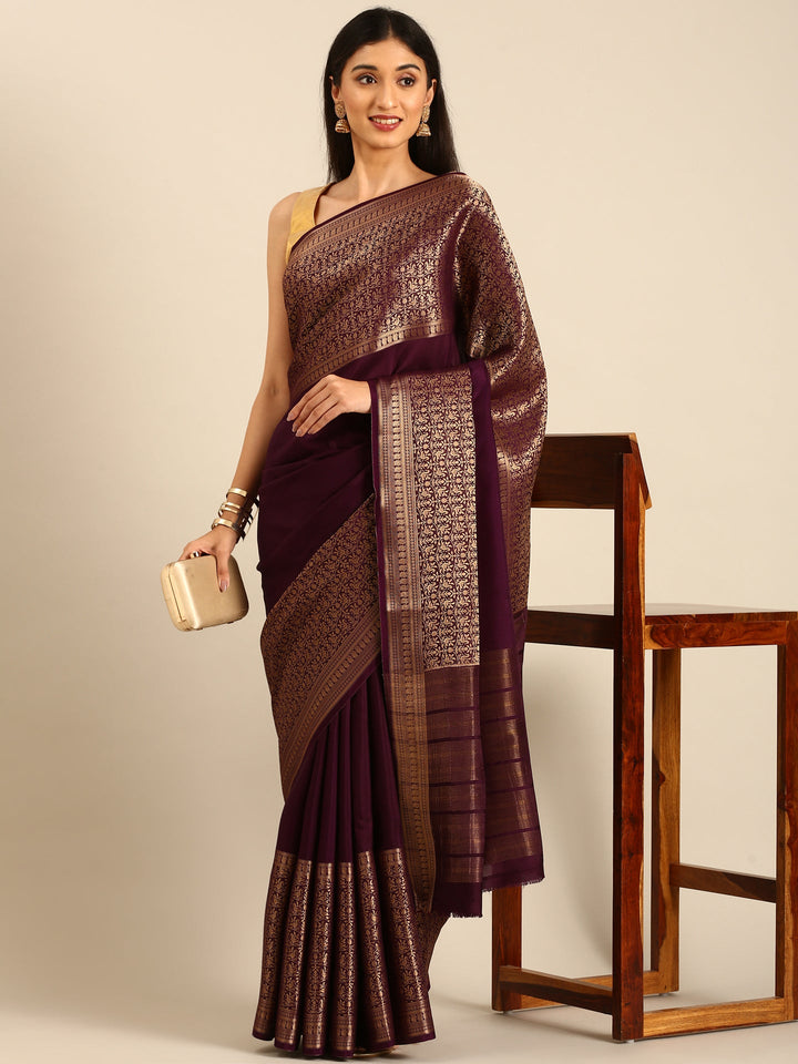 Neerus Maroon crepe woven saree with zari jaal border - detail view 1