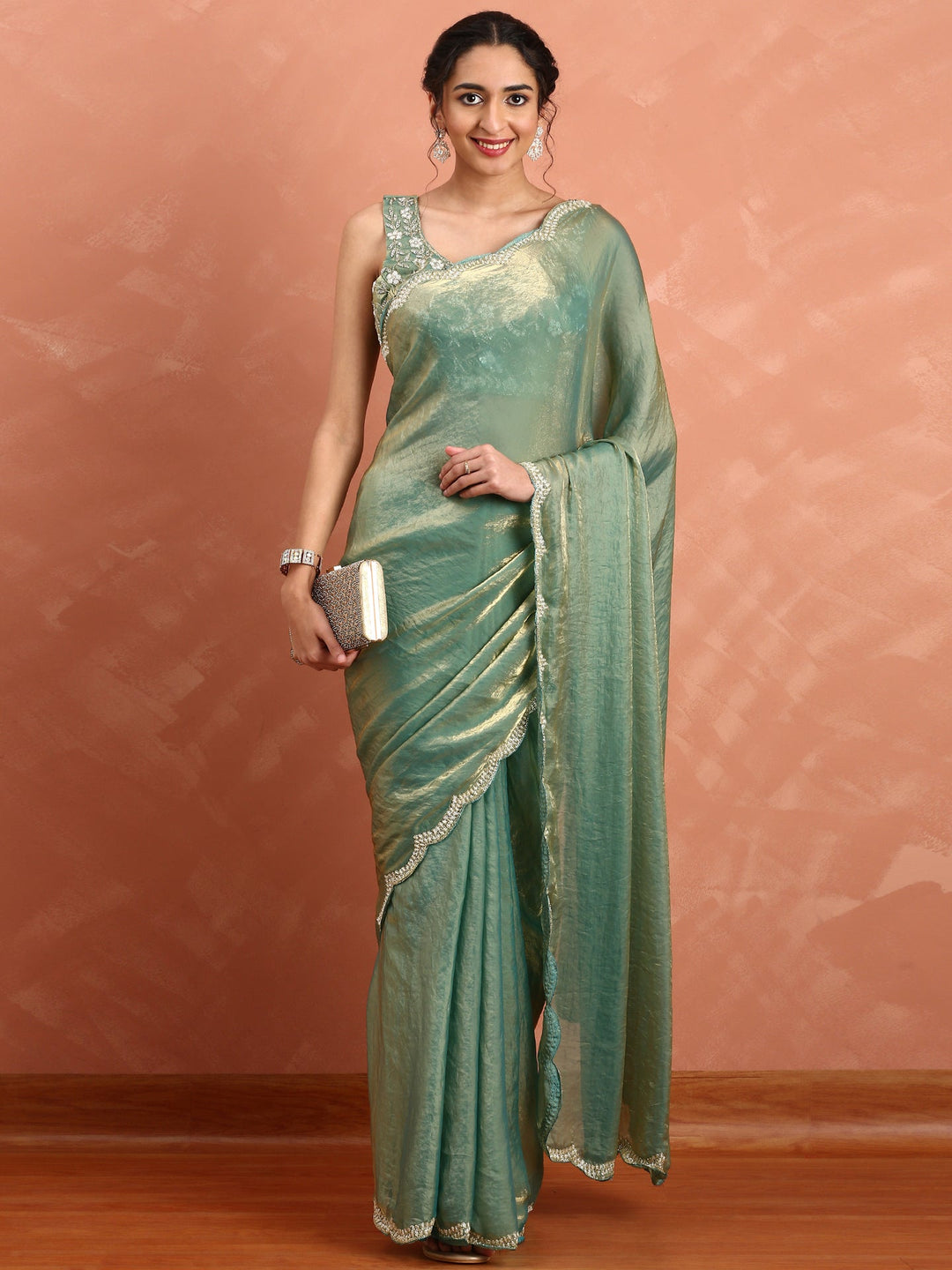 Neerus Green tissue hand embroidered saree - front view