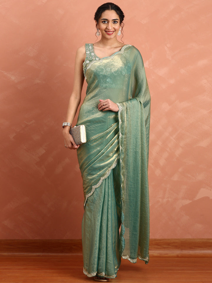 Neerus Green tissue hand embroidered saree - front view