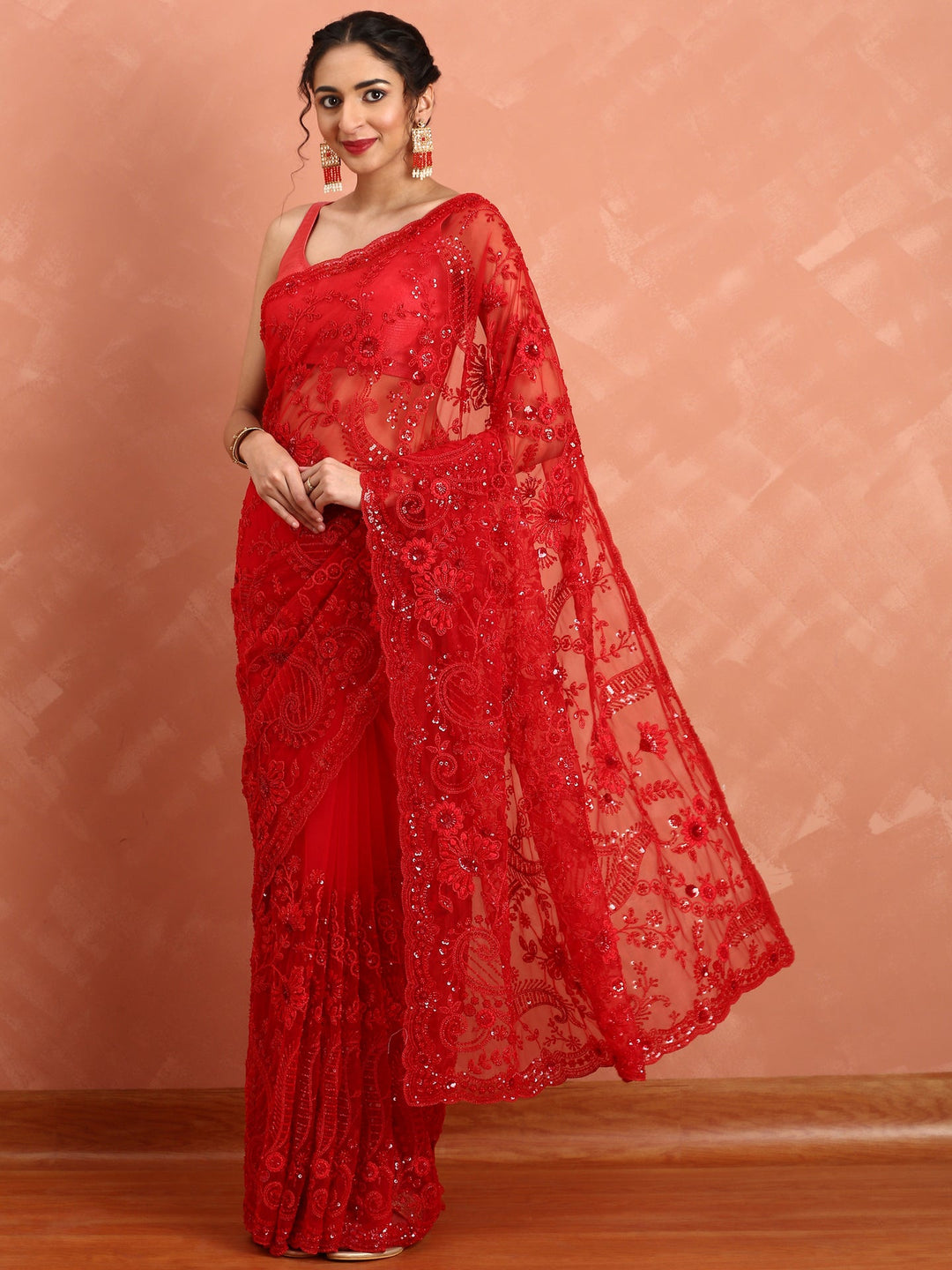 Neerus Red net hand embroidered saree with pearl sequins - back view