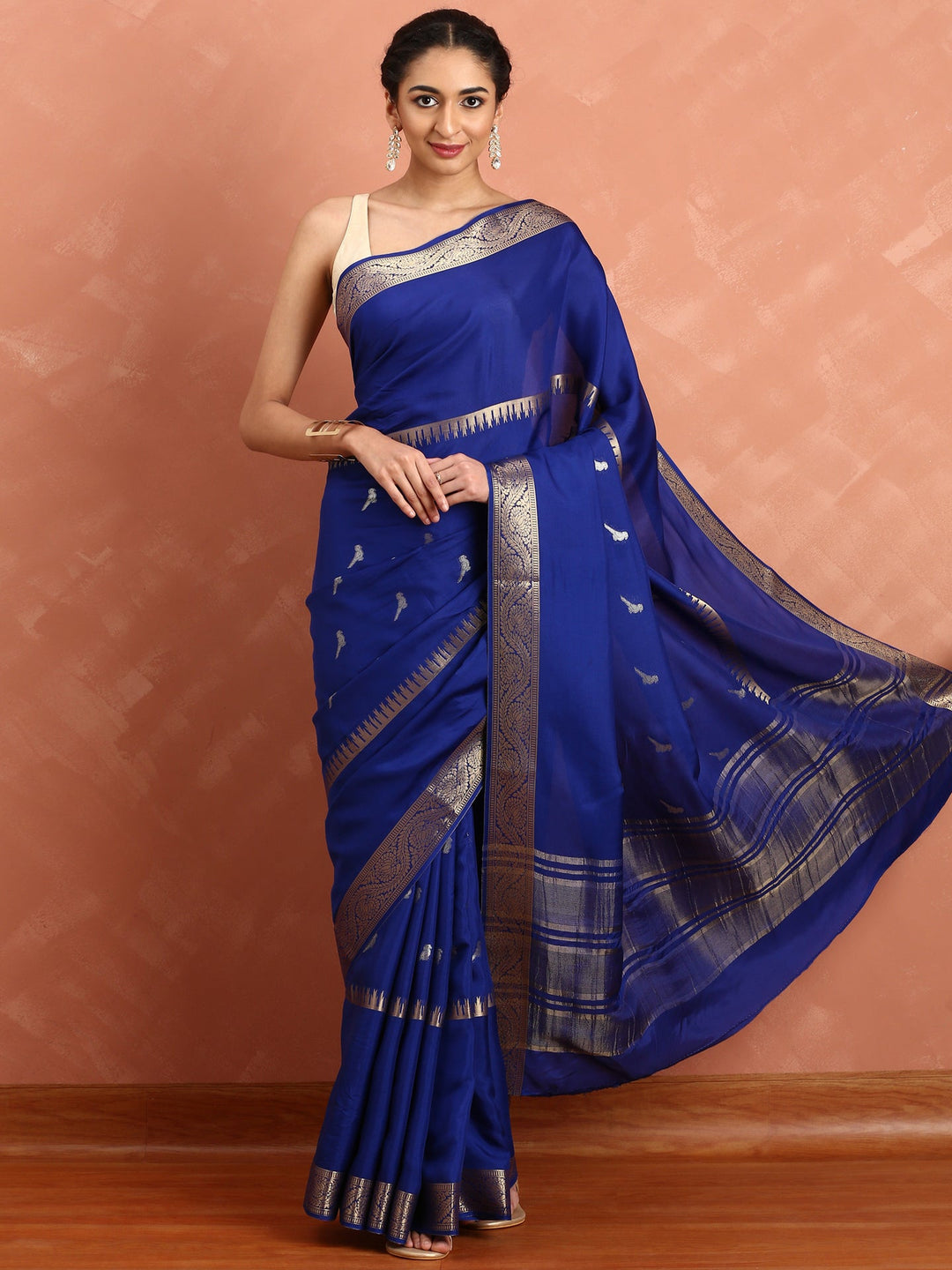 Neerus Blue Silk Woven Saree with Ethnic Pichvai Motifs - back view