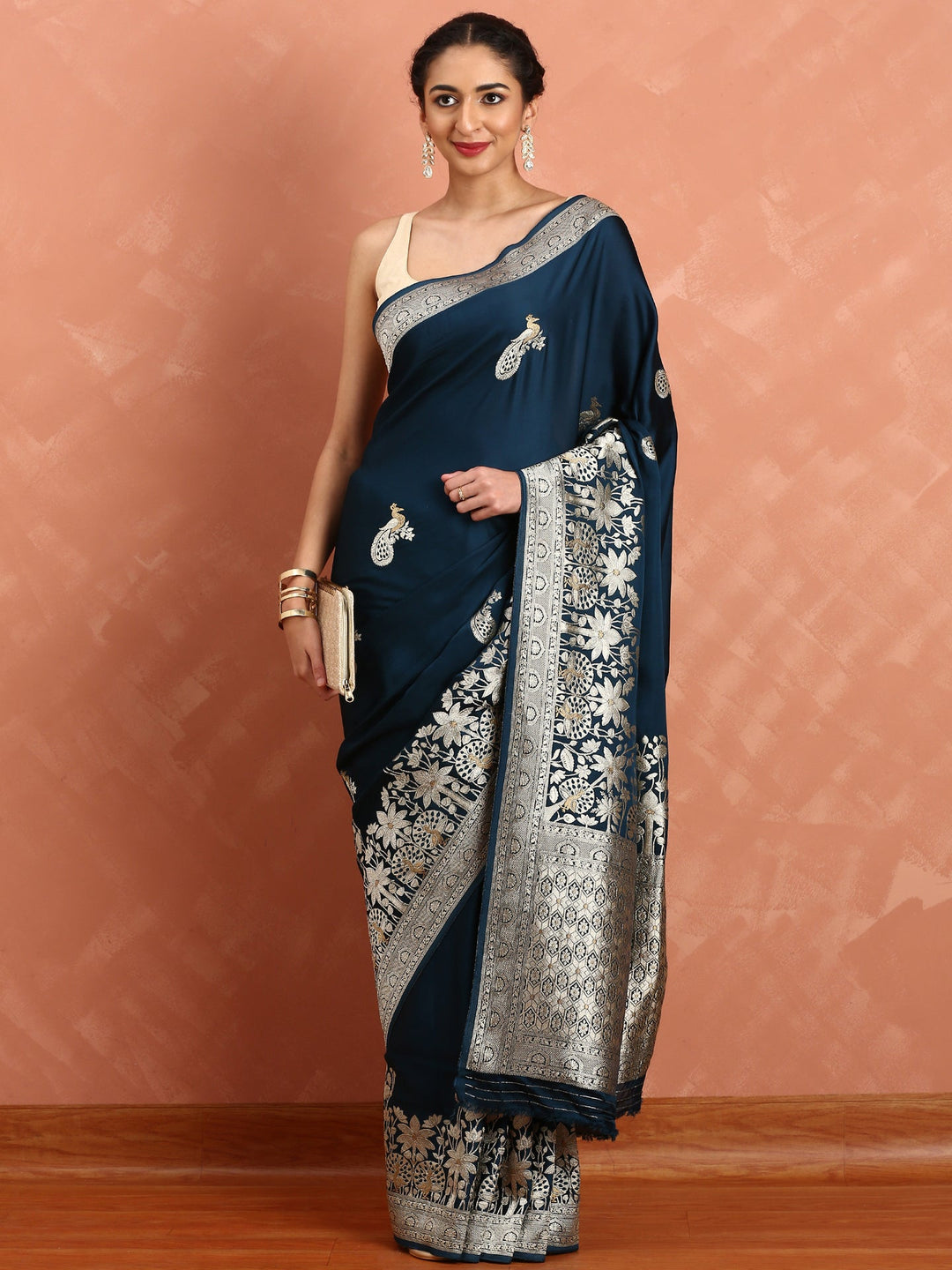 Neerus Blue Banarasi woven saree with peacock motifs - back view