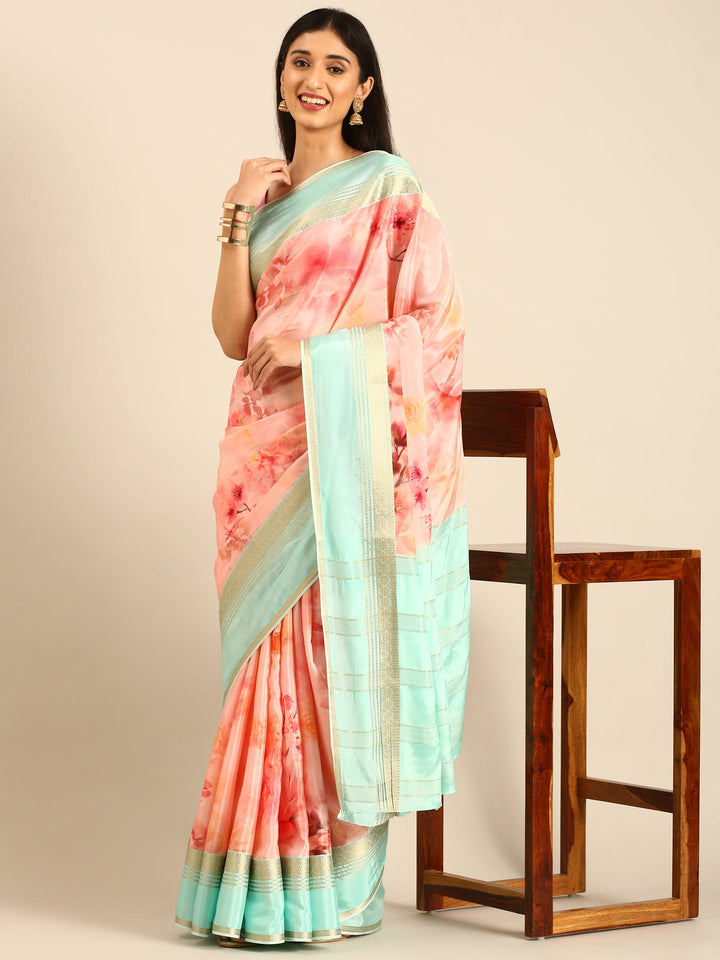 Neerus Pink crepe woven saree with zari border - detail view 1