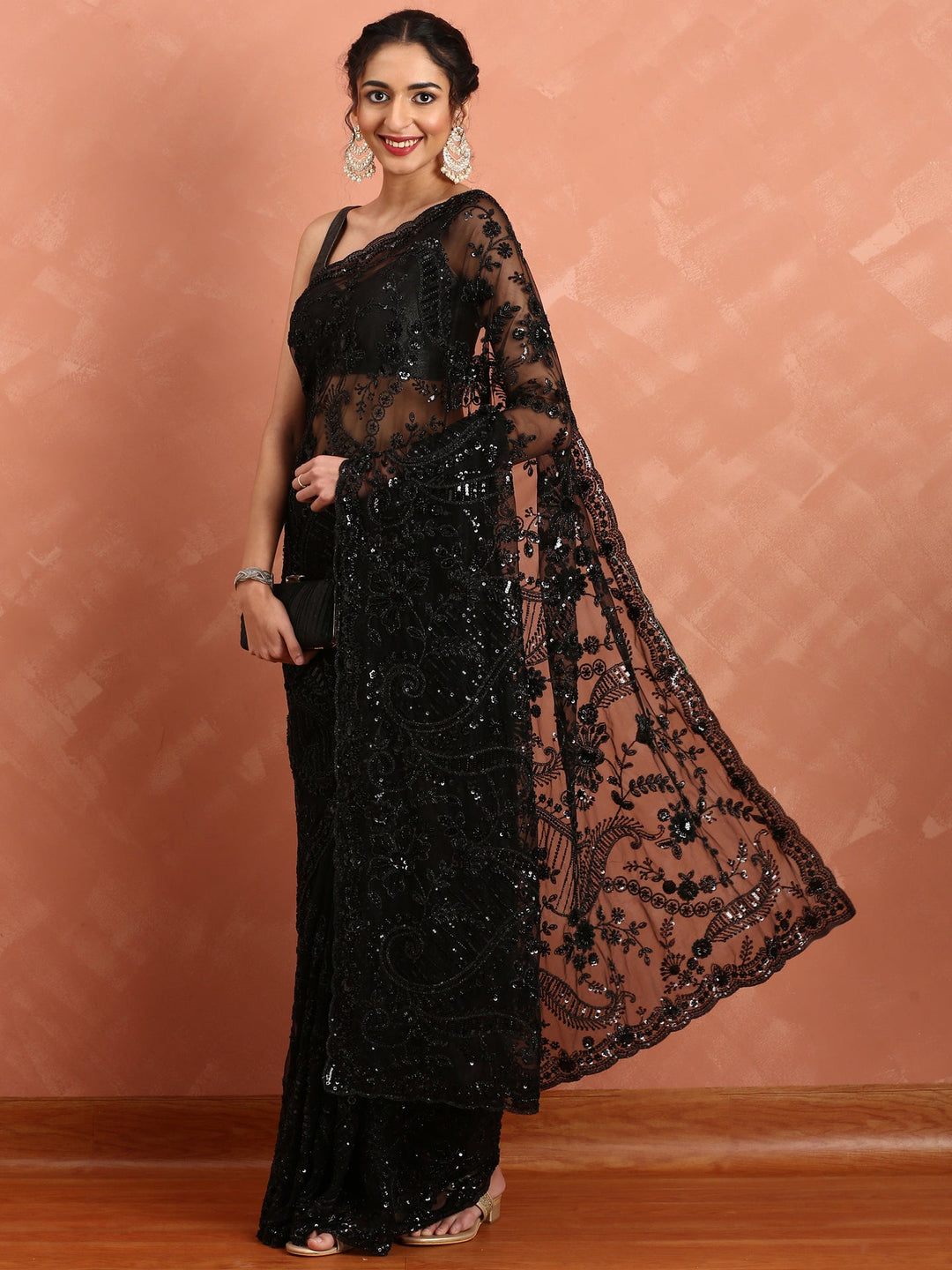 Neerus Black net hand embroidered saree with sequins - back view