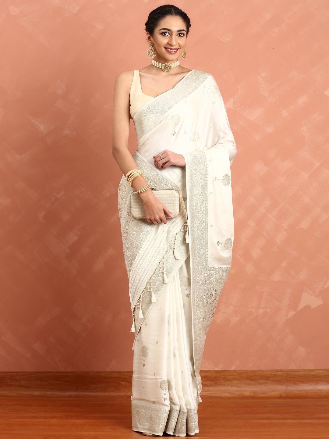 Neerus White Banarasi woven silk saree with zari border - front view