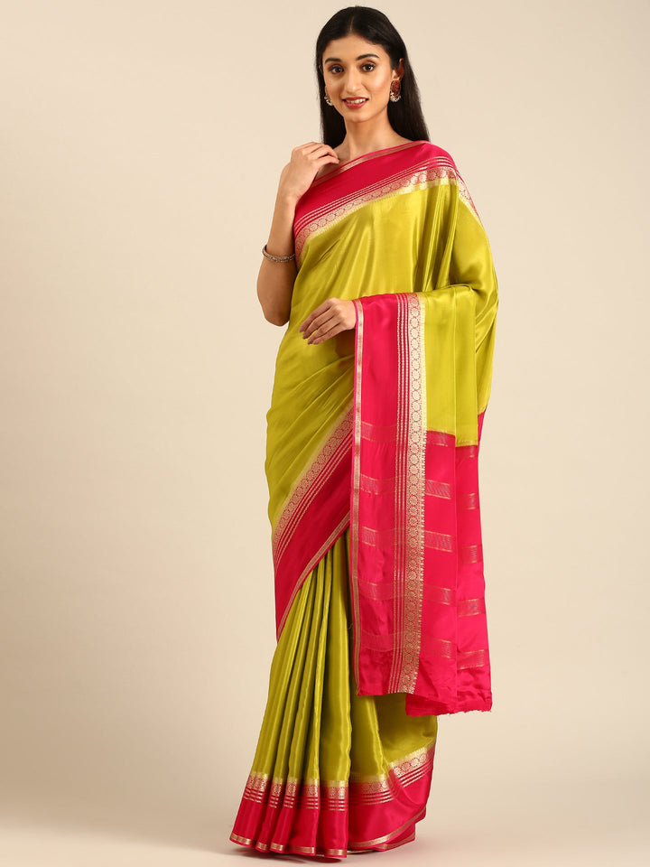 Neerus Green silk woven saree with contrast border and pallu - detail view 1