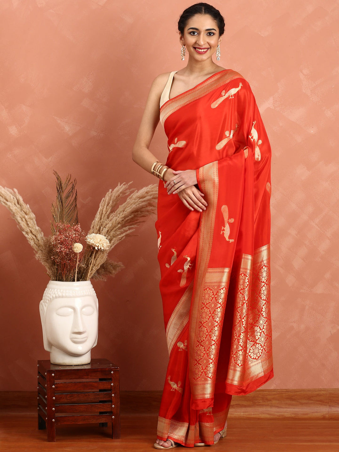 Neerus Red silk woven saree with peacock booti pallu - front view