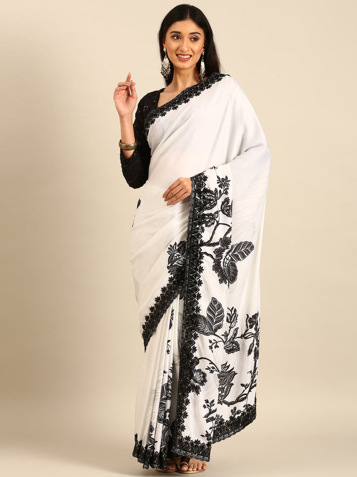 Neerus Black satin hand embroidered printed saree - back view