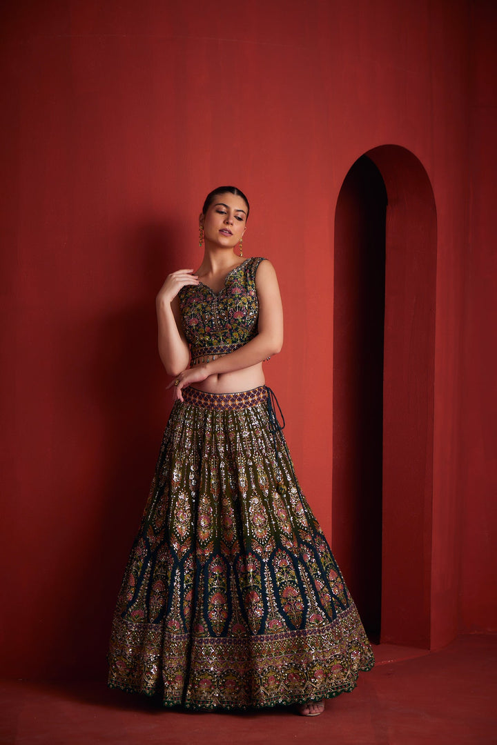 Neerus Green silk embellished lehenga set - side view