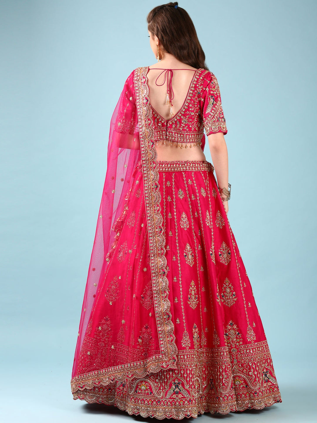 Neerus Pink silk hand embroidered lehenga set - side view