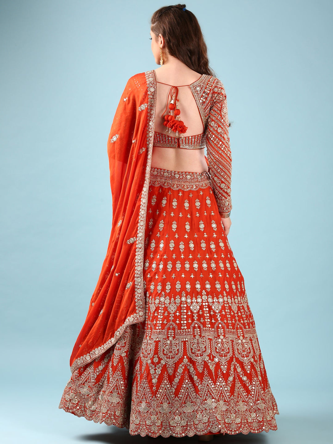 Neerus Orange georgette hand embroidered lehenga set - side view