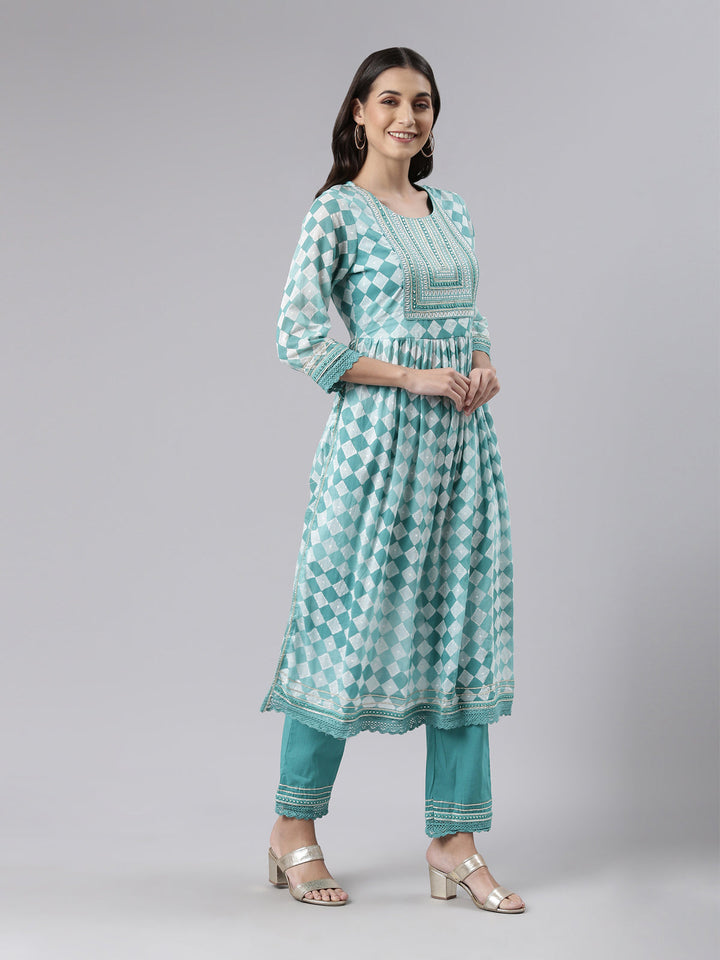 Neerus Green embroidered kurta set with palazzo and dupatta - back view