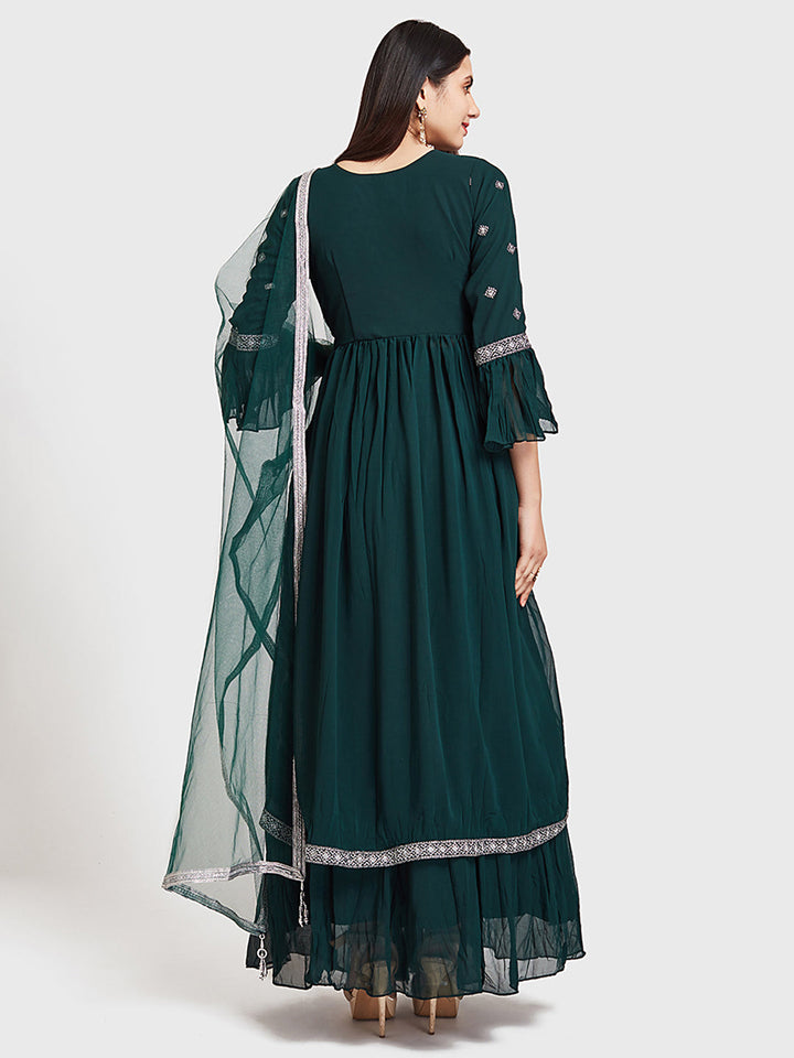 Neerus Green embroidered kurta set with skirt and dupatta - back view