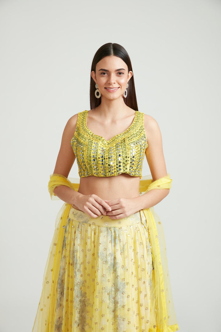 Neerus Yellow georgette embellished lehenga choli set - back view