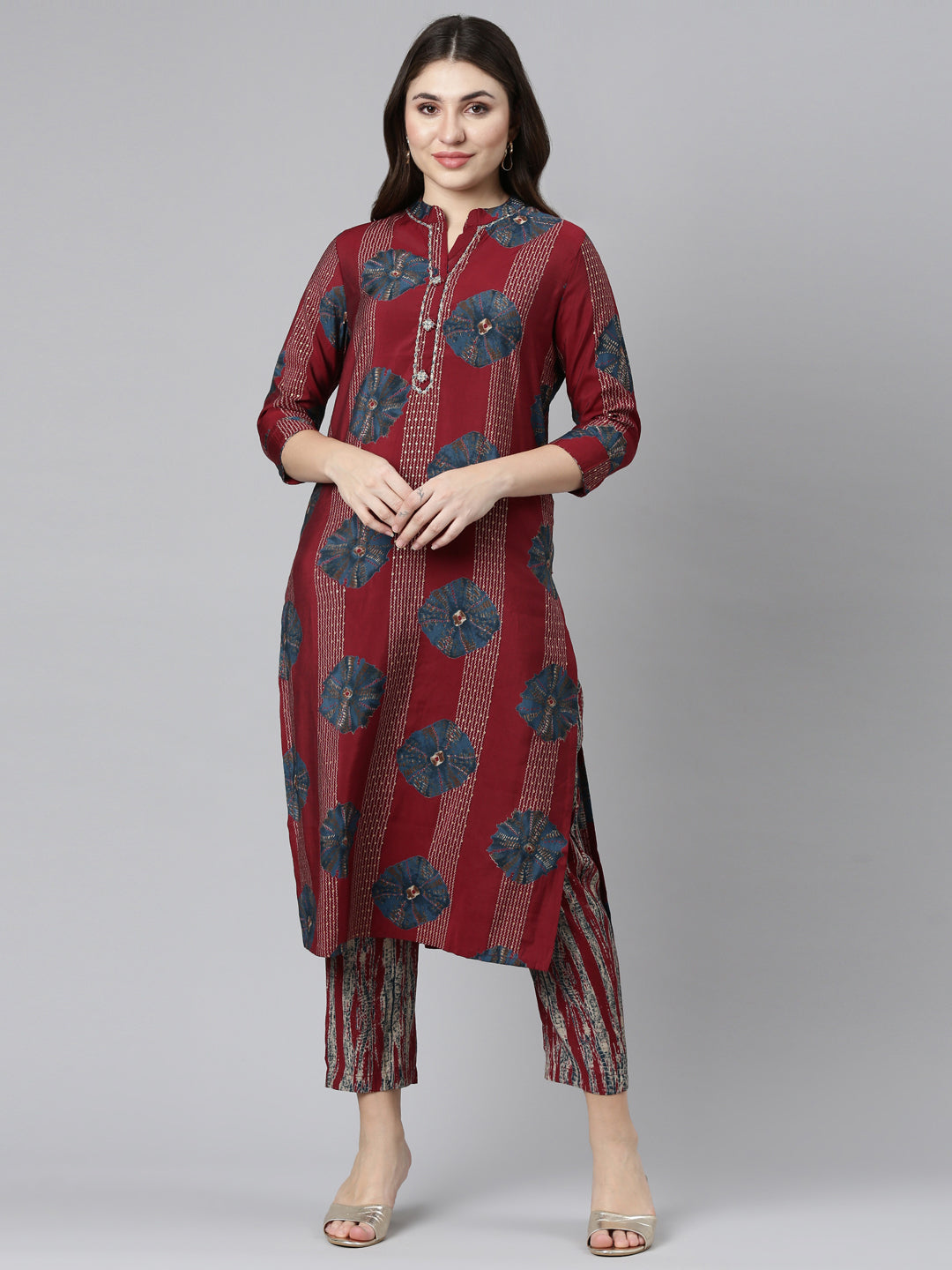 Neerus Maroon printed straight kurta set - front view