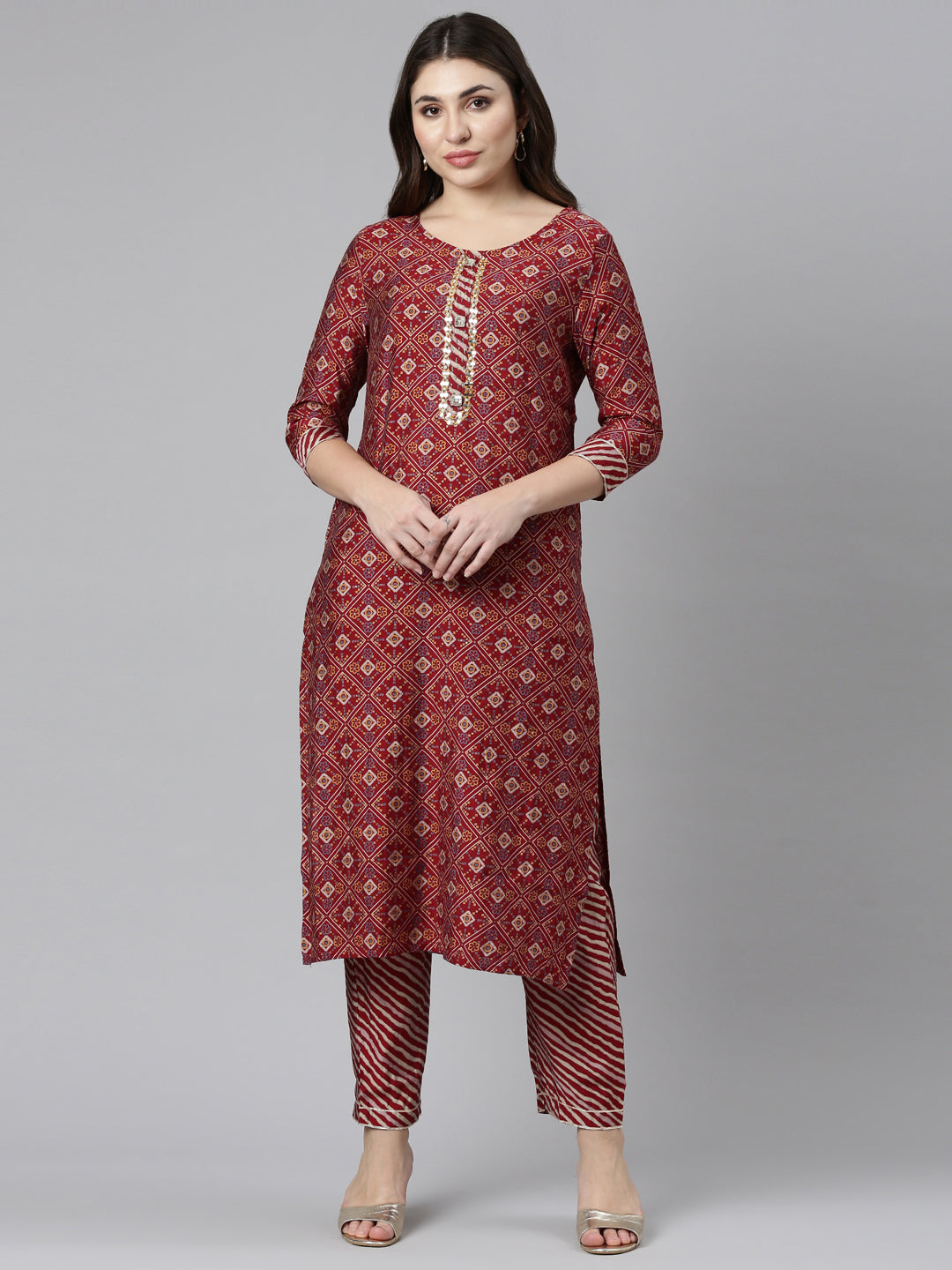 Neerus Maroon printed straight kurta set - front view