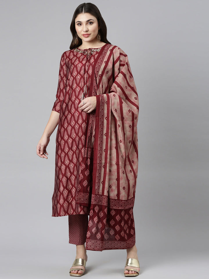 Neerus Maroon printed straight kurta set - front view