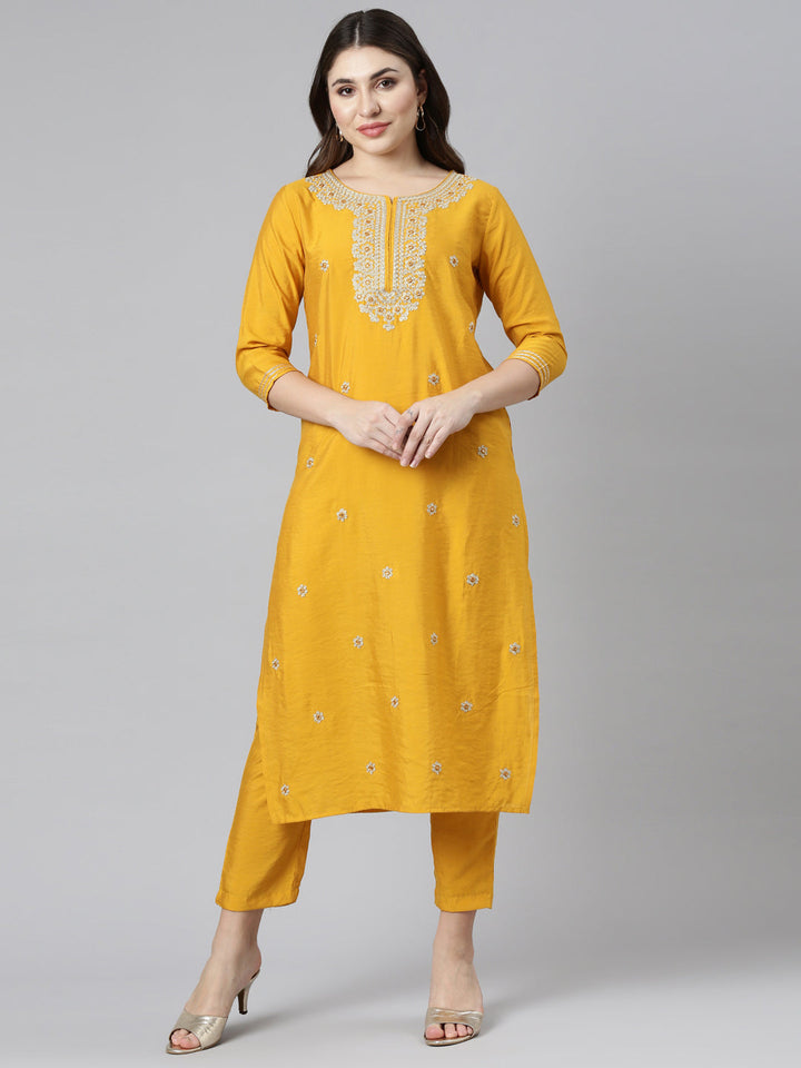 Neerus Yellow embroidered straight kurta set - front view