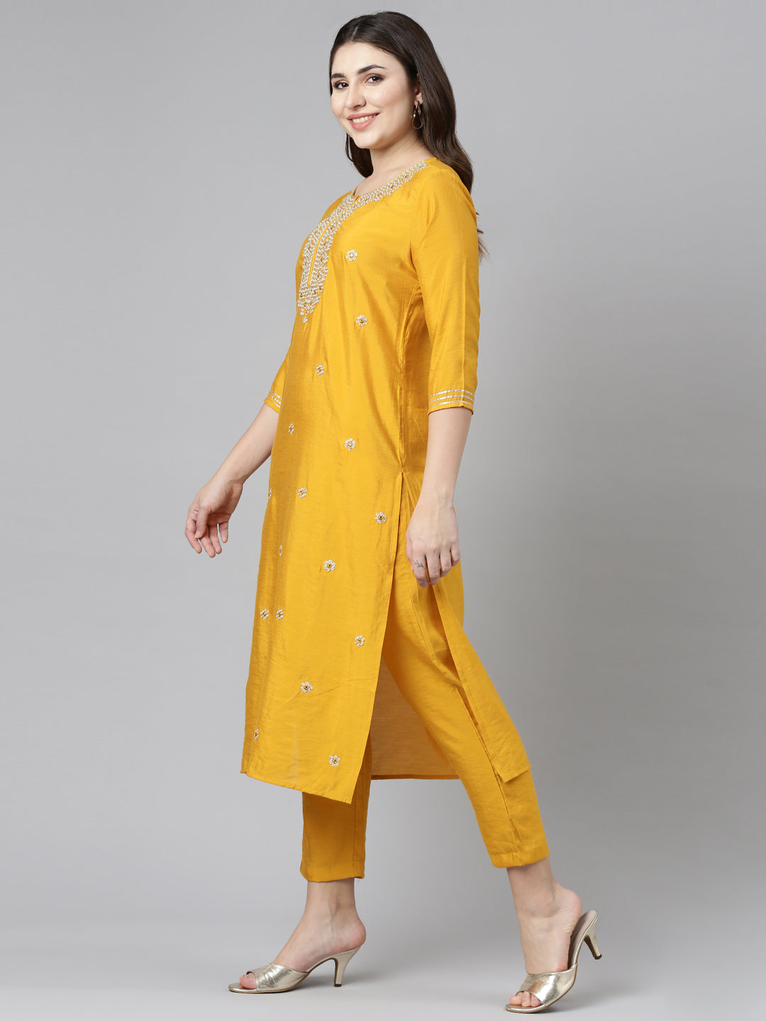 Neerus Yellow embroidered straight kurta set - back view