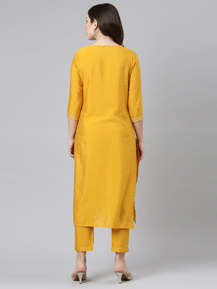 Neerus Yellow embroidered straight kurta set - side view