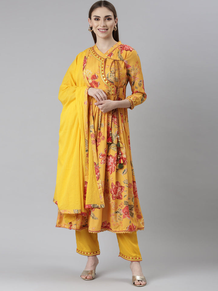Neerus Yellow muslin printed kurta set with trouser and dupatta - front view