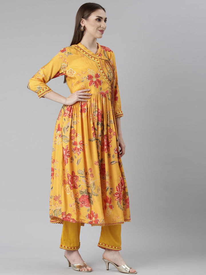 Neerus Yellow muslin printed kurta set with trouser and dupatta - back view