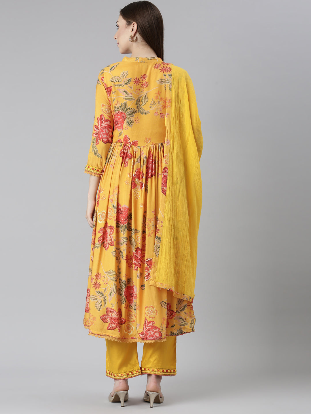 Neerus Yellow muslin printed kurta set with trouser and dupatta - side view