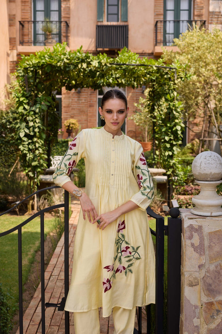 Neerus Yellow cotton embroidered kurta set - side view